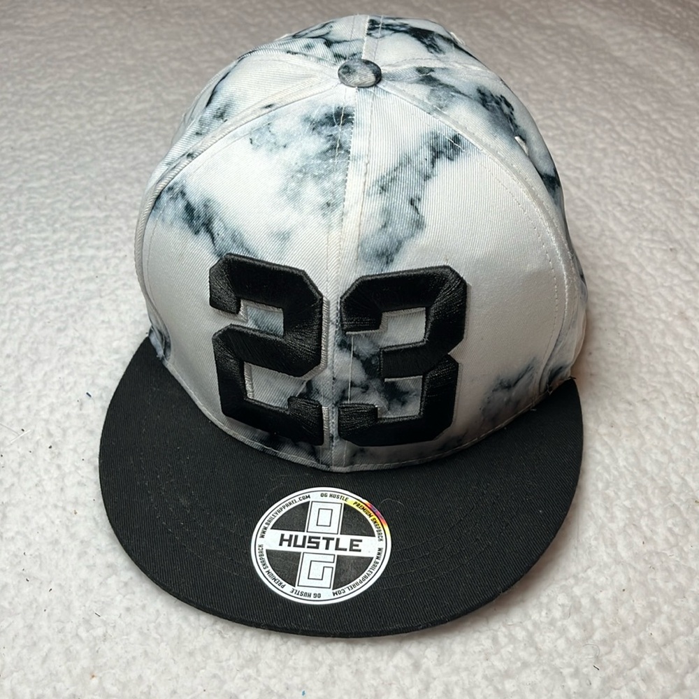 Hustle Snap Back Cap/Hat black, gray, and white tie-dye with black brim.NWOT